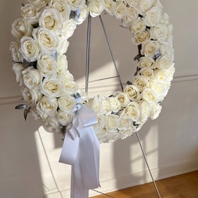 Unique funeral wreath with white roses